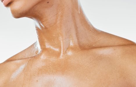skincare-neck-and-man-in-studio-for-beauty-welln-2025-04-06-08-18-26-utc Skincare, neck and man in studio for beauty, wellness and hydration closeup against a white backgro.